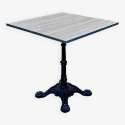 Modern Bistro Table, Cast Iron Base, Laminated Top -Room Fold Zone 01f461d2 5ecd 4e5d ae68 e028a37db421